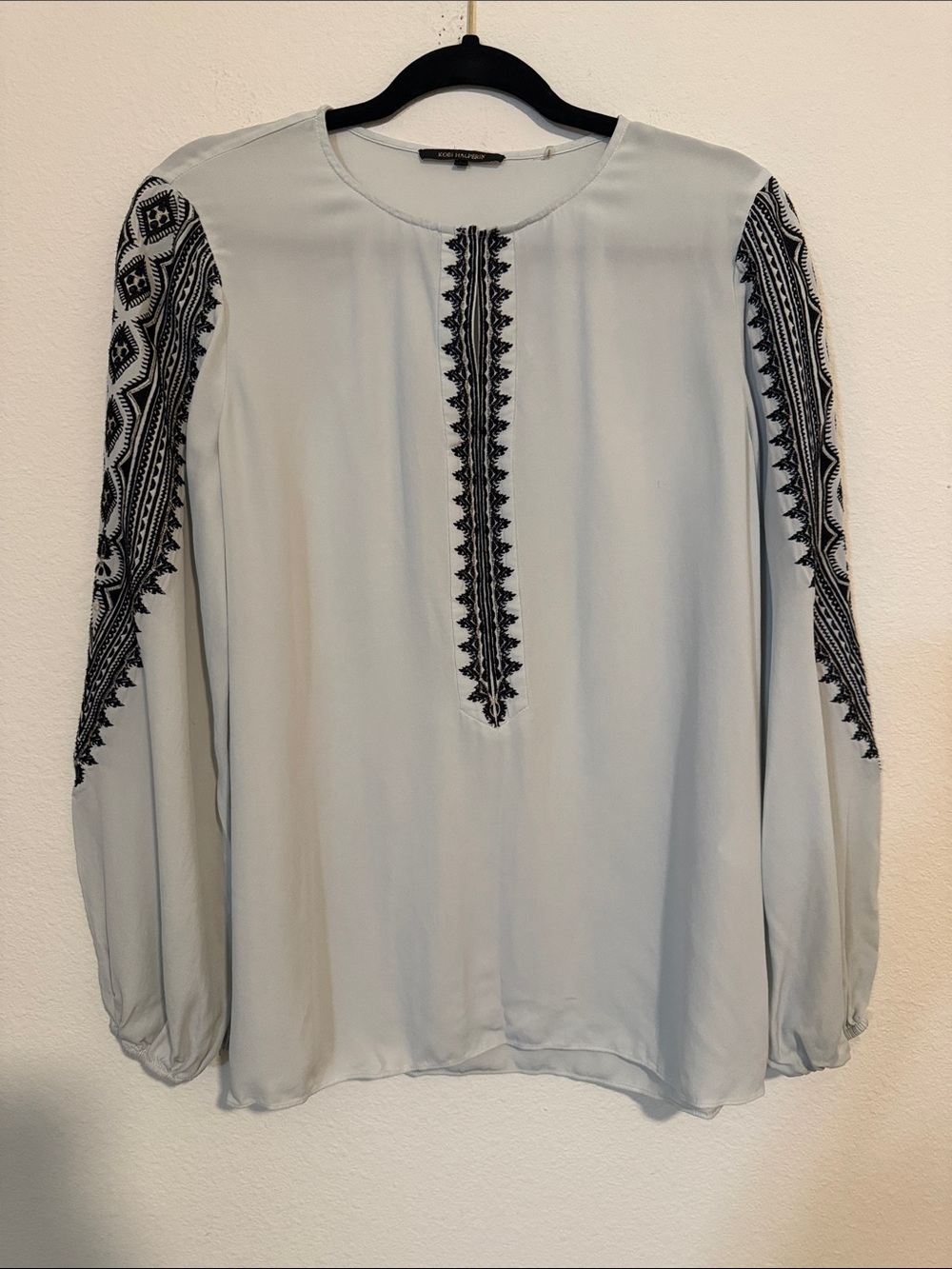 Kobi Halperin 100% silk light blue blouse with black geometric embroidery